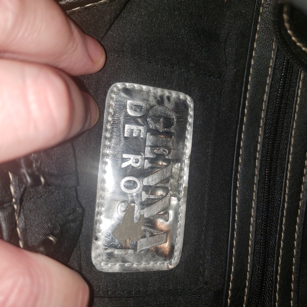 Black leather Genna De Rossi purse